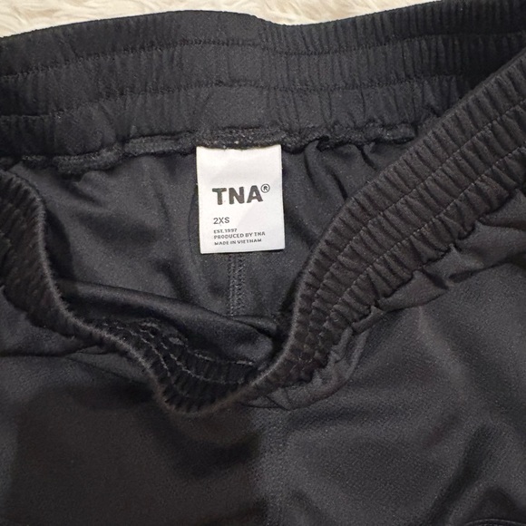 Black Women’s Aritzia TNA athletic shorts - Picture 2 of 5